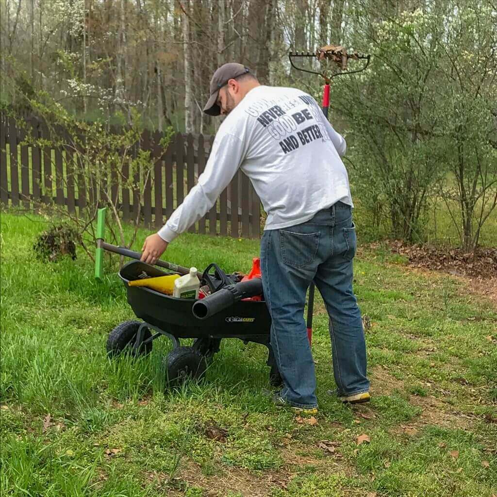 Guy loading his Gorilla cart