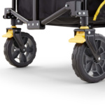 Close-up of a black and yellow wheel of a Gorilla Made heavy-duty cart.