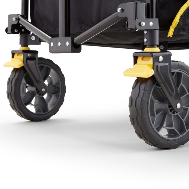 Close-up of a black and yellow wheel of a Gorilla Made heavy-duty cart.