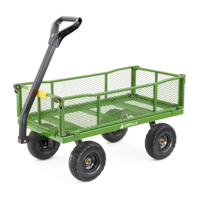 Green metal wagon by Gorilla Made with mesh sides and black handle.