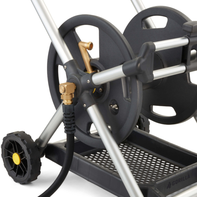 Close-up of a gray Gorilla Made hose reel with metal frame and rubber wheels.