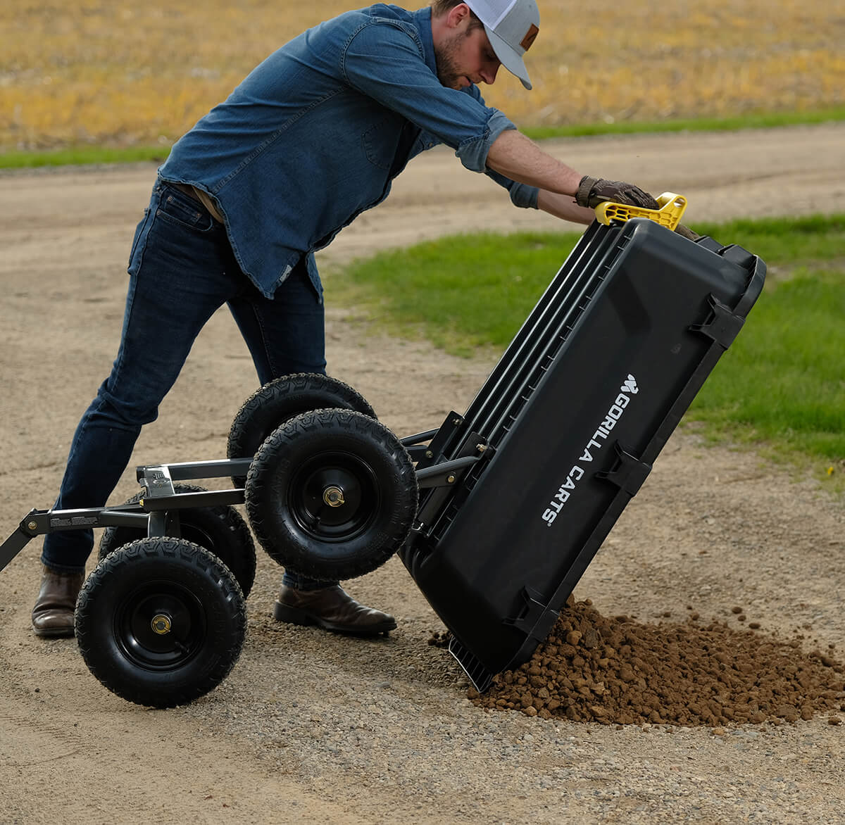Man pouring dirt out of a GCG-7