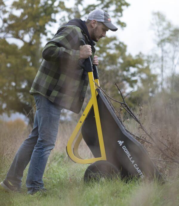 man dumping contents from a GCR-7 on the ground