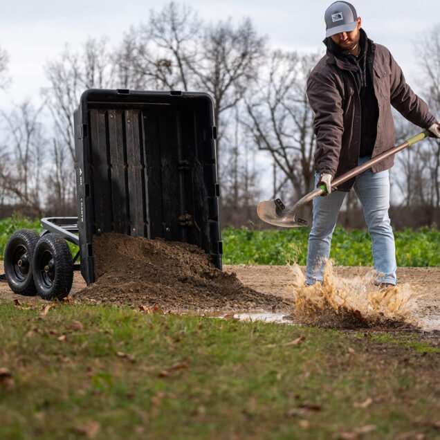 Man pulling dirt out of a GOR-10H