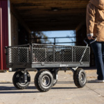 Gorilla Made utility cart with mesh sides and large wheels, logo visible.