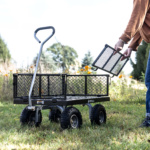 Black Gorilla utility cart on grass with removable metal side panel.
