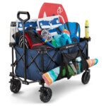 Gorilla Made utility cart filled with colorful beach gear, water toys, and accessories.
