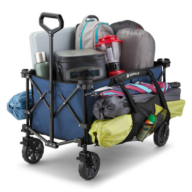 Blue Gorilla cart filled with camping gear, backpacks, cooler, and lantern.