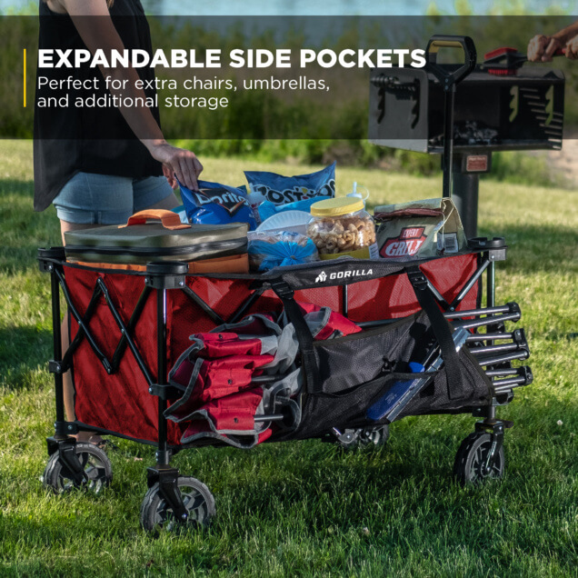 Expandable side pockets on red Gorilla cart holding snacks and collapsible chairs.