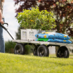Gorilla cart with plants and potting mix bags; "Proven Winners" text visible.