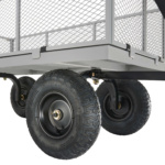 Close-up of a Gorilla Made heavy-duty cart with sturdy black tires, mesh sides.