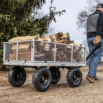 Gorilla Made utility cart loaded with firewood, pulled on a dirt path.
