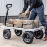 Gorilla Made cart carrying bricks; steel frame, black wheels, outdoor use.