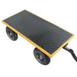 Yellow and black Gorilla Made utility cart with four large wheels and diamond-patterned surface.