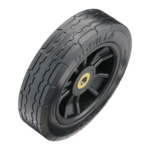 Black utility tire with yellow hub, "GORILLA" and "HEAVY" embossed on the tread.