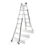 Adjustable white Gorilla Made ladder with safety labels, positioned on stairs.