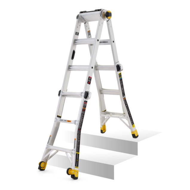 Gorilla Made GMPXT 15B ladder in silver and yellow on stairs, heavy-duty build.