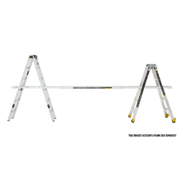 White GMPXT 23B COM Scaffold with yellow accents. Text: "RAIL BRACKET ACCESSORY & PLANK SOLD SEPARATELY."
