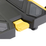 Close-up of a black utility cart with yellow foot pedal from Gorilla Made.