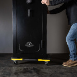 A black safe marked "Yosemite" on a yellow dolly, part of Gorilla Made's utility line.