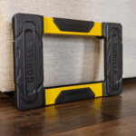 Yellow and black Gorilla Made utility product frame on a wooden floor.