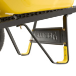 Close-up of a yellow Gorilla Made wheelbarrow, black frame, and engraved panel.